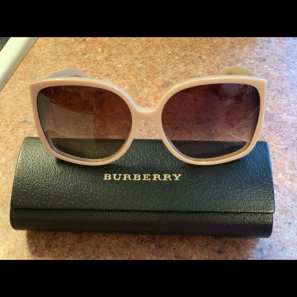 Burberry sunglasses. Like new. No issues.